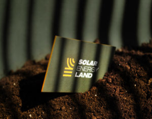 solar energy land branding logo design visual identity stationary sun green yellow